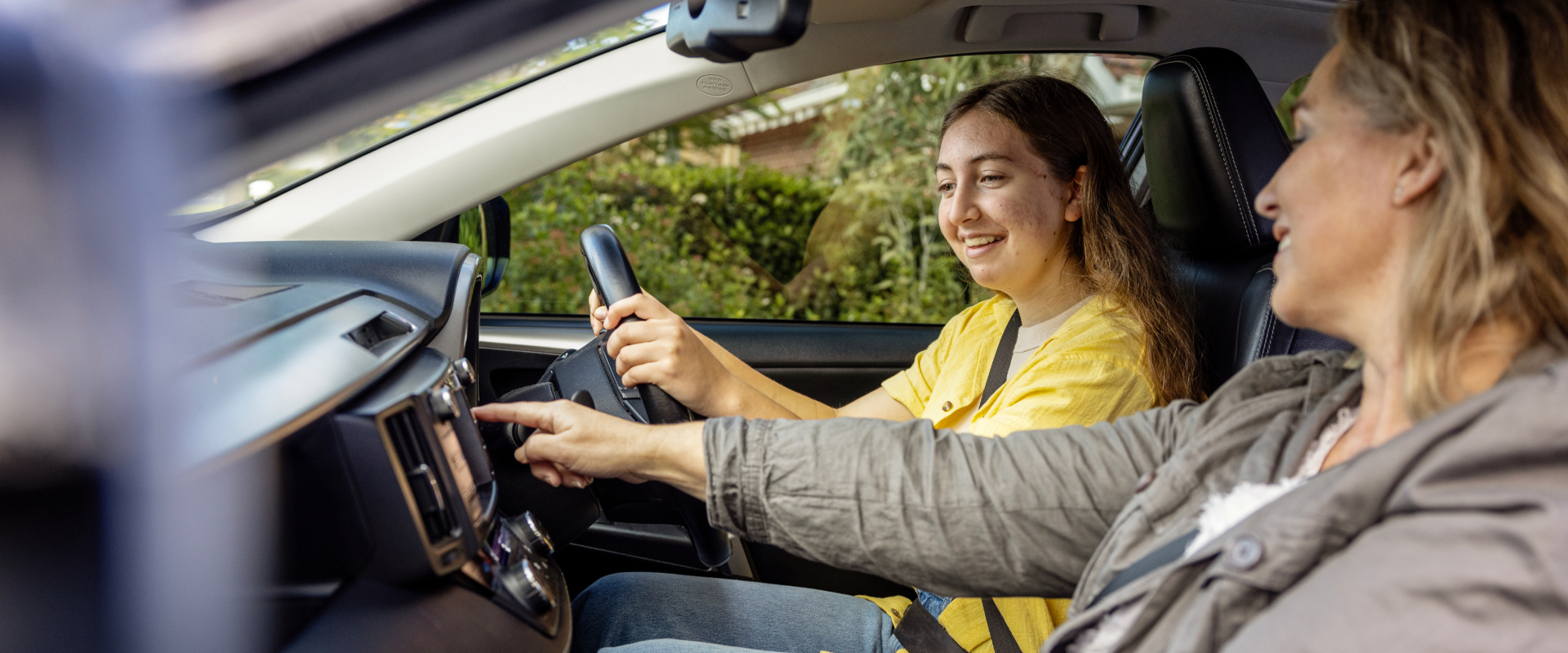 Learner driver and supervisor in the car chatting
