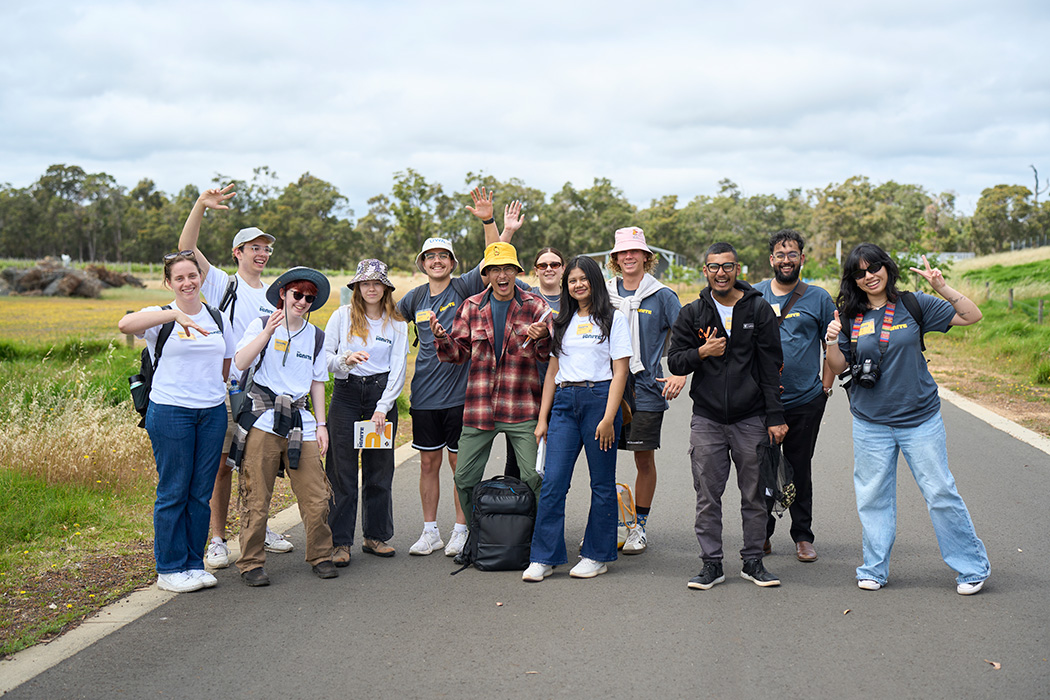 A large group of RAC ignite participants are standing together in a group for a photo.