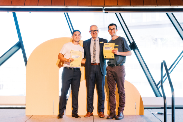 Winners Matt and James holding their certificates at the 2024 Ignite Leadership celebration event