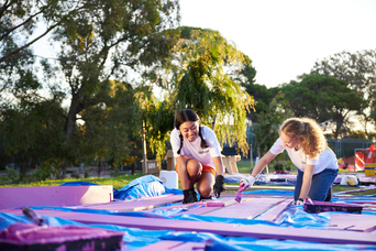 RAC Ignite participants painting project furniture