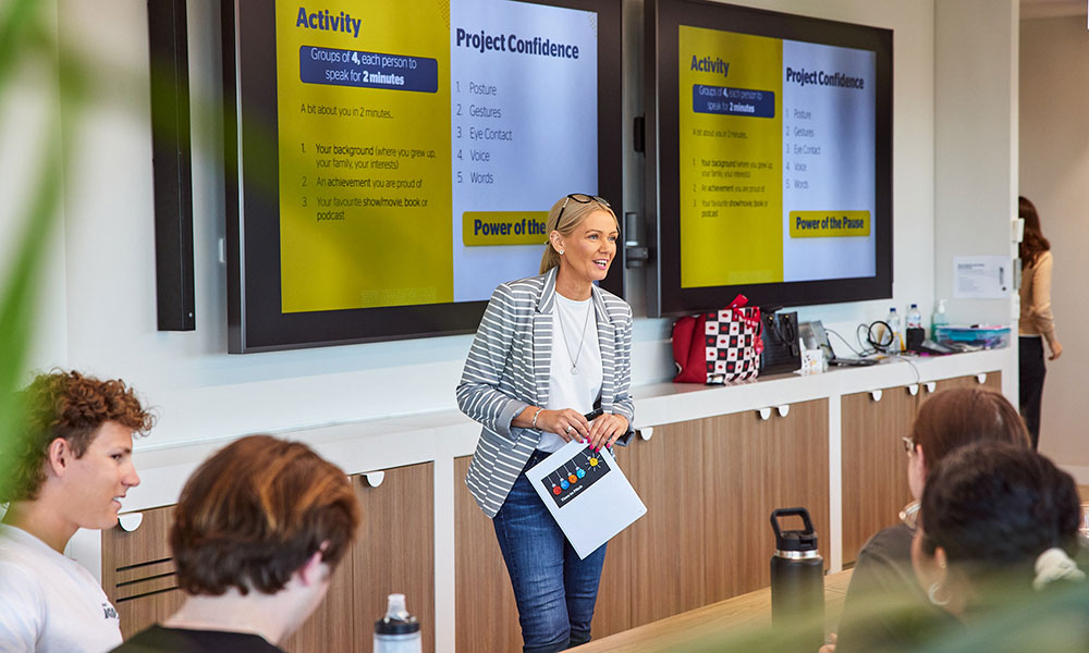 RAC's Hayley Scott is running a presentation workshop to a room of young adults