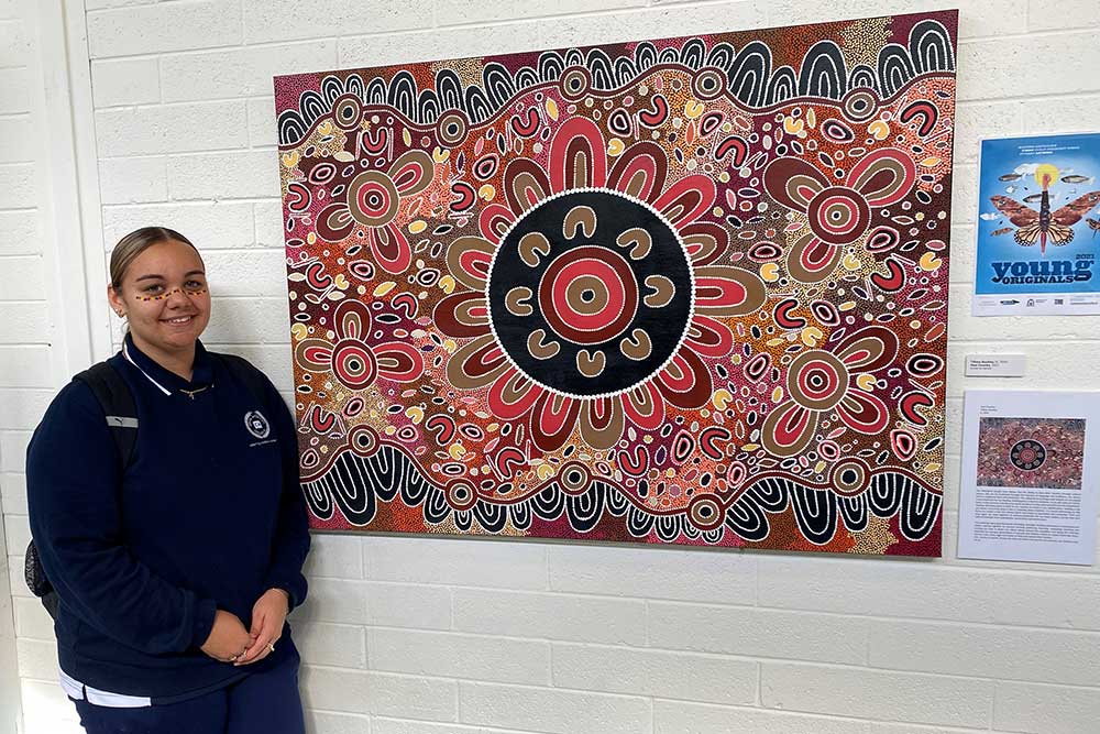 Cecil Andrews College Student Tiffany Buckley with her artwork 'Heal Country'