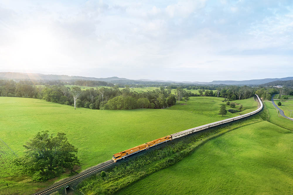 The Great Southern travels through the green plains of Nana Glenn NSW