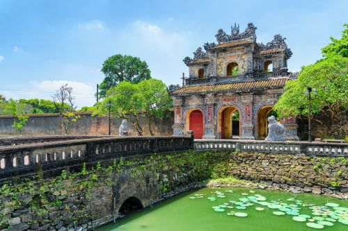 Historic imperial gate and moat in Hue Citadel.