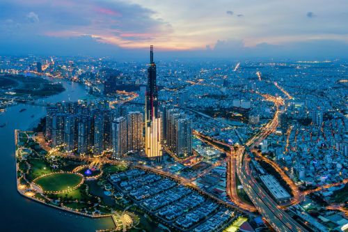 Aerial view of Ho Chi Minh City’s modern skyline at dusk.