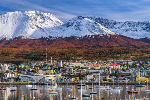 Icy mountains with a harbour in front