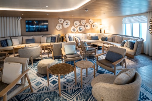 Modern and stylish lounge aboard Jacques Cartier vessel.