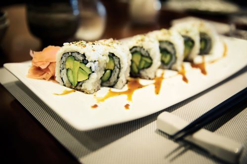 A plate of nicely arranged sushi