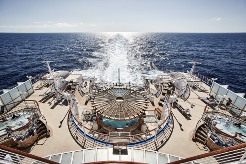 Back pool deck of the Diamond Princess cruise ship with the ocean in the background