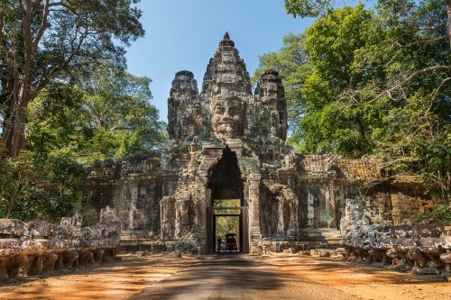 The stunning Angkor Thom Gate with the intricate carvings. 